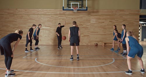 Female Athletes Playing Basketball