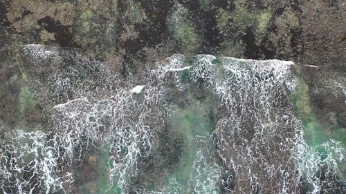 Top View of Sea Waves Reaching Shore 