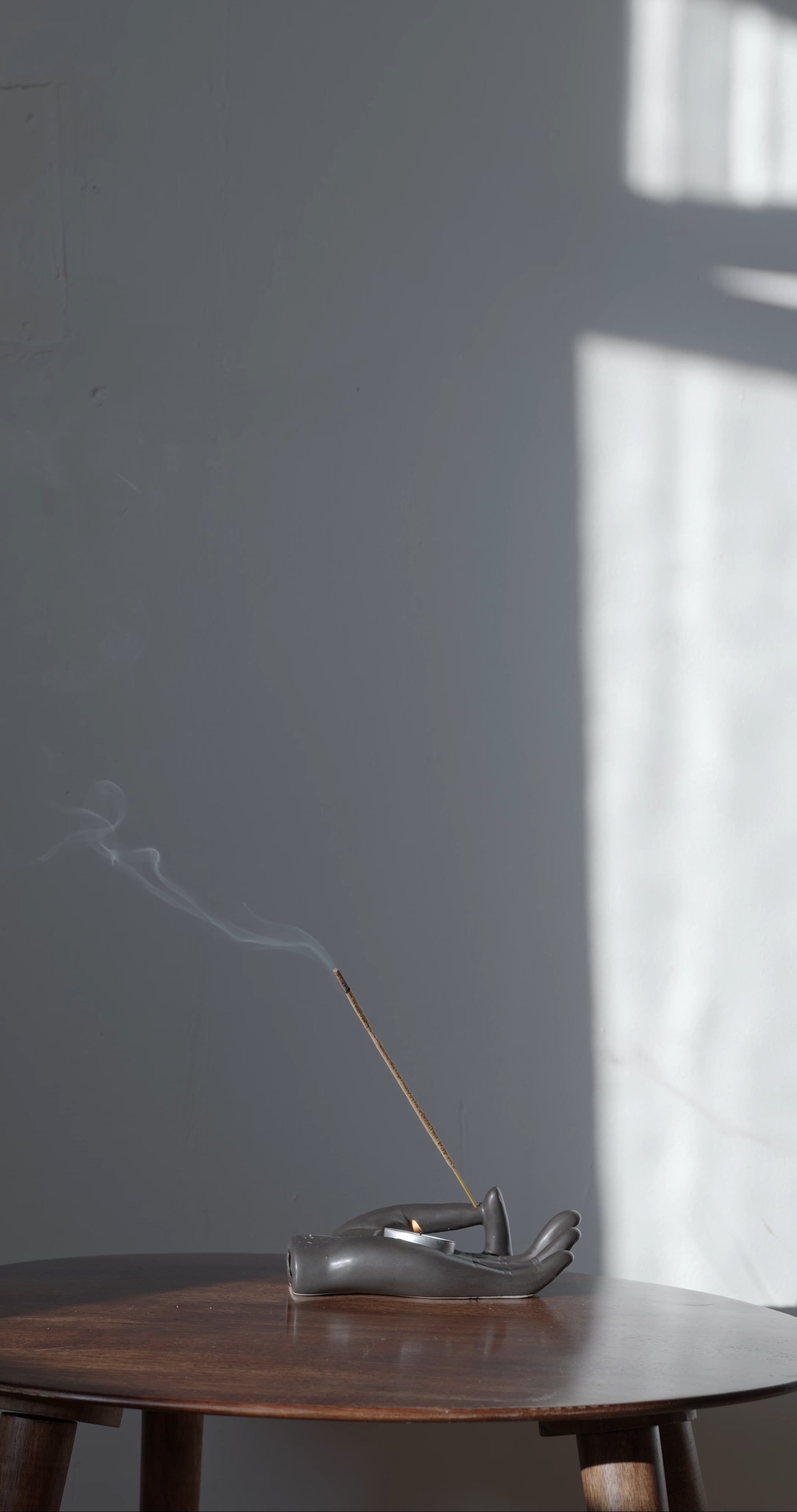 Burning Incense Stick on Hand Shaped Holder · Free Stock Video