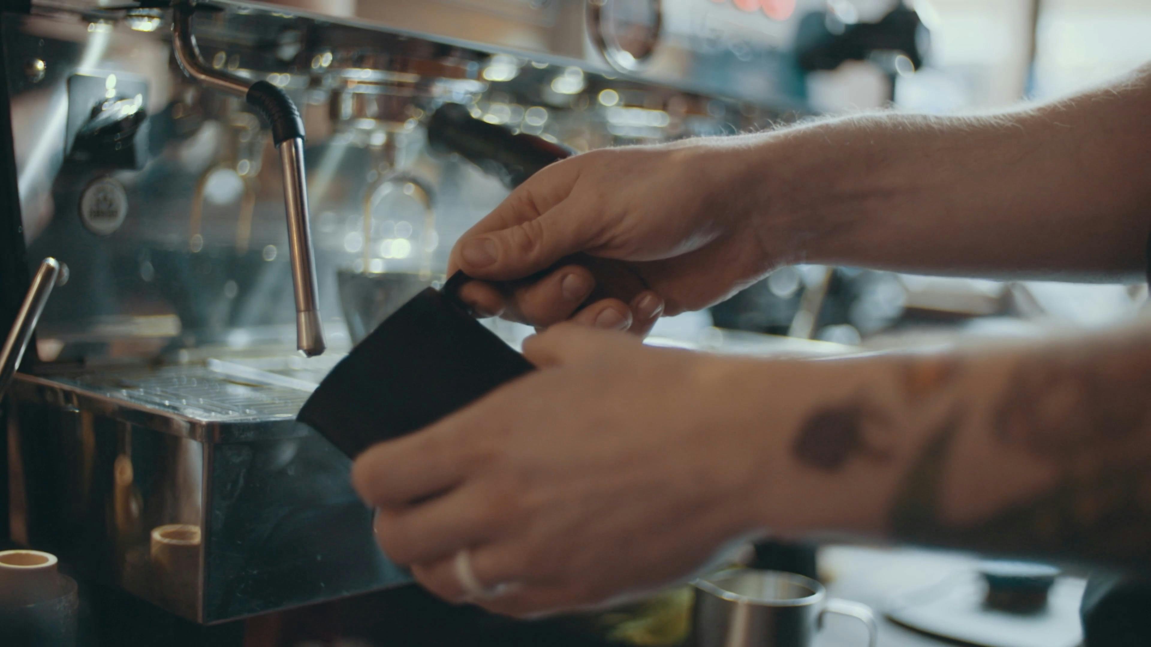 A Person Taking Hot Water in a Coffee Maker Free Stock Video Footage