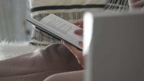 A Person Reading a Book