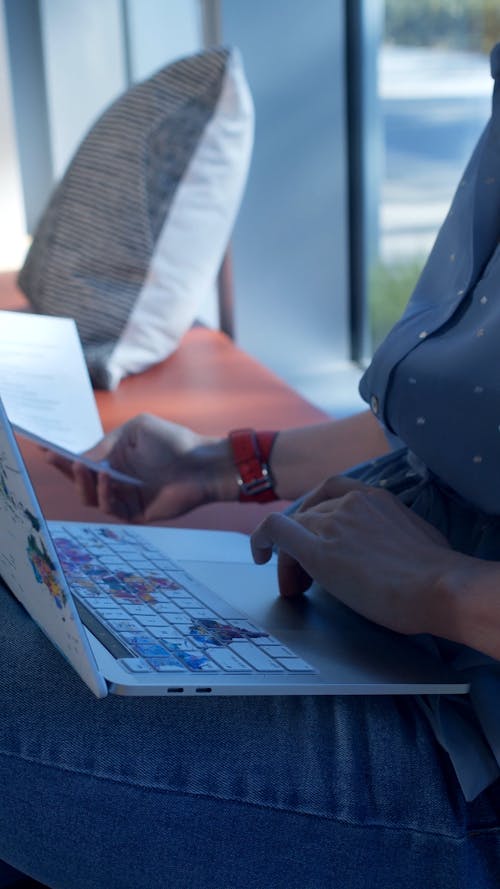 A Woman Working With A Laptop