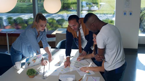 A Group Of People In A Business Meeting