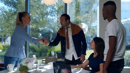 Handshakes At The Start Of A Business Meeting