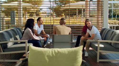 A Group Of People In A Business Meeting