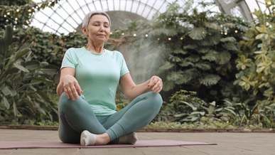 Preview of our wellness story video — a woman practicing yoga