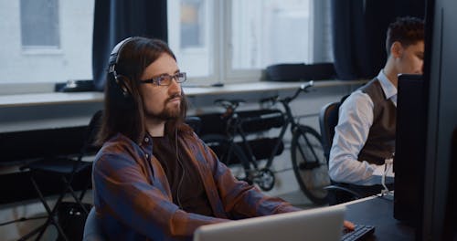 Men using Computer in Office