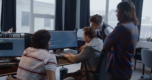 People Coding on Computer