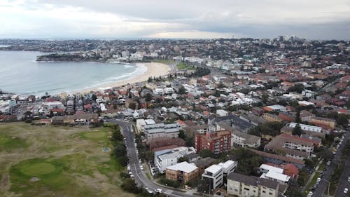 An Aerial Footage of a City with a Beach