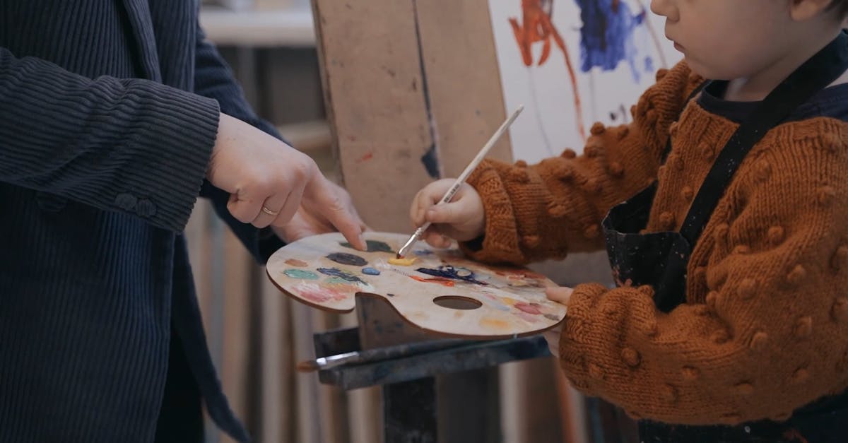 A Child Mixing Colors in a Palette Free Stock Video Footage, Royalty ...