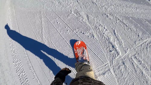 Snowboarding Down a Slope