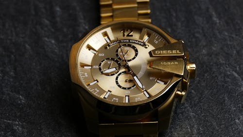 Close-Up View of a Gold Analog Watch