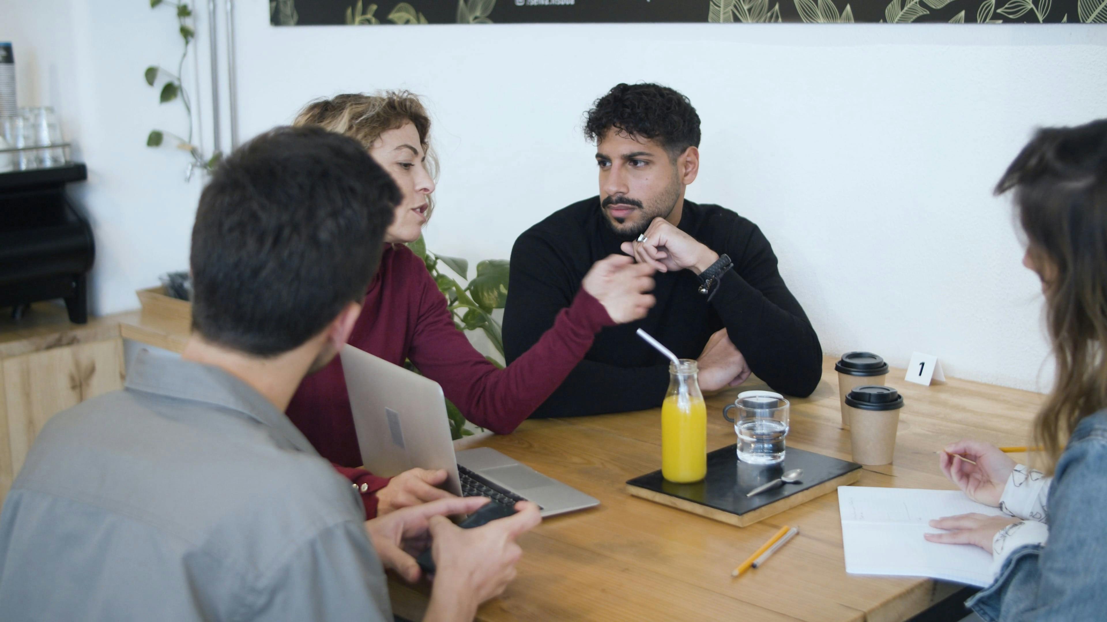 Meeting in a Coffee Shop · Free Stock Video