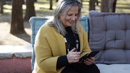 Elderly Woman Using a Cellphone 