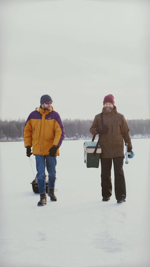 Men Walking in a Frozen Lake 