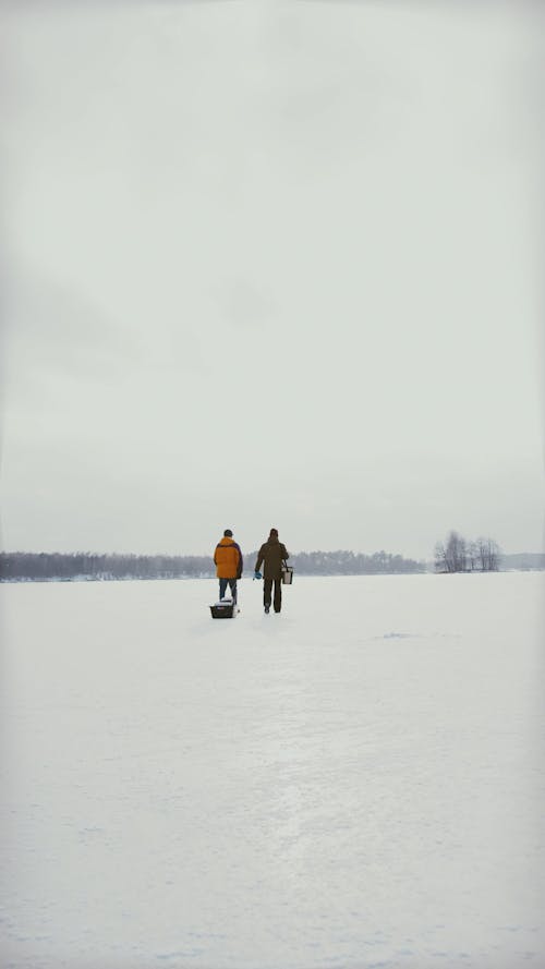 Men Walking omn the Ice 