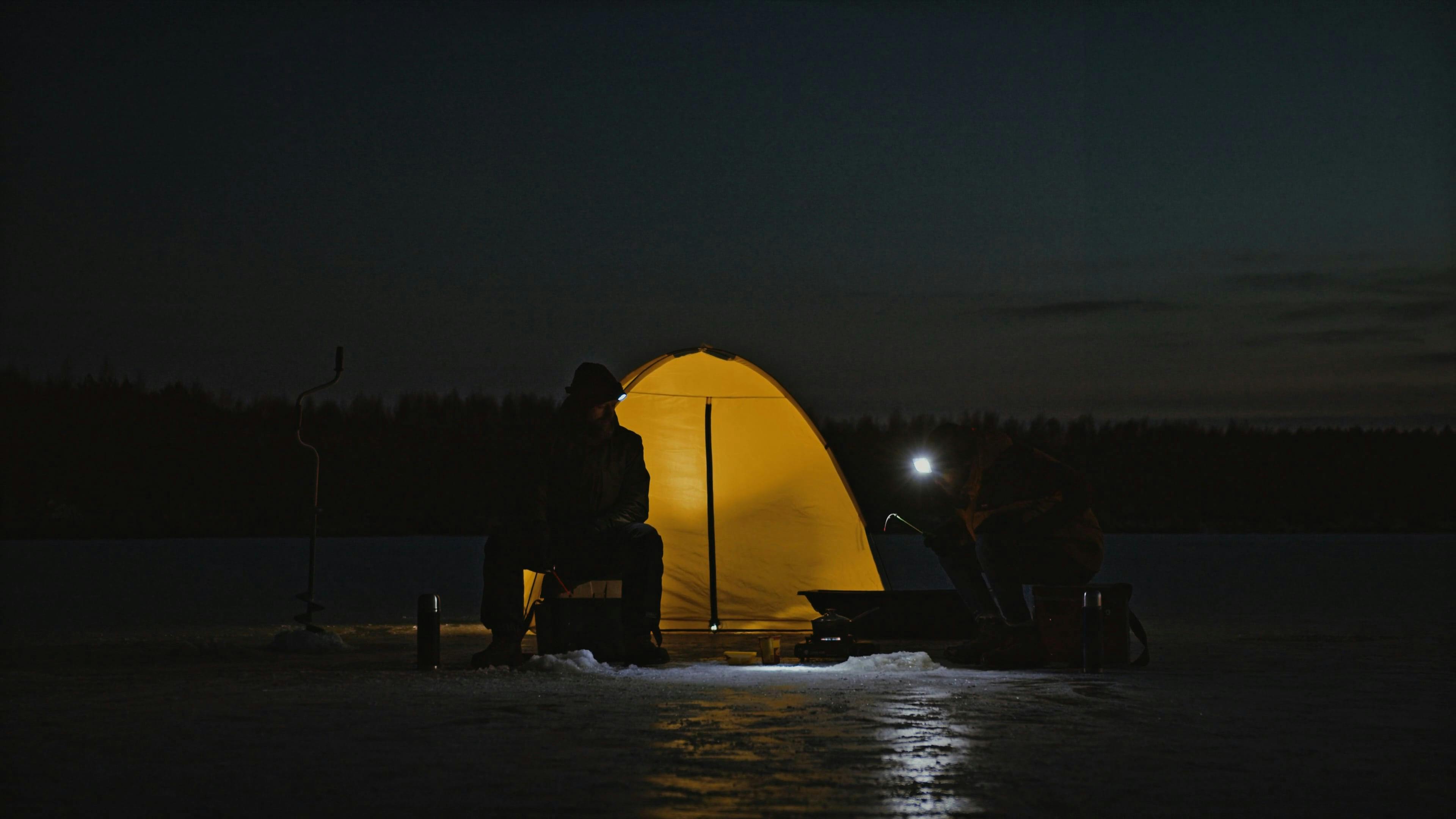 People Ice Fishing at Night · Free Stock Video