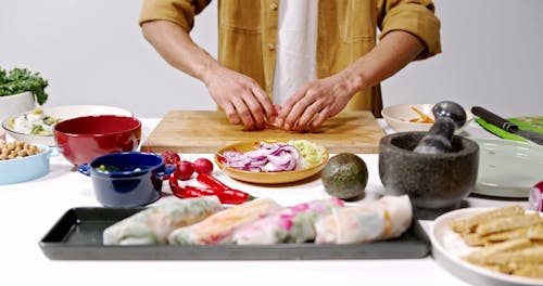 Chef Making Vegetarian Rolls 