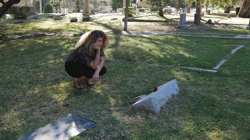 Woman Visiting a Grave