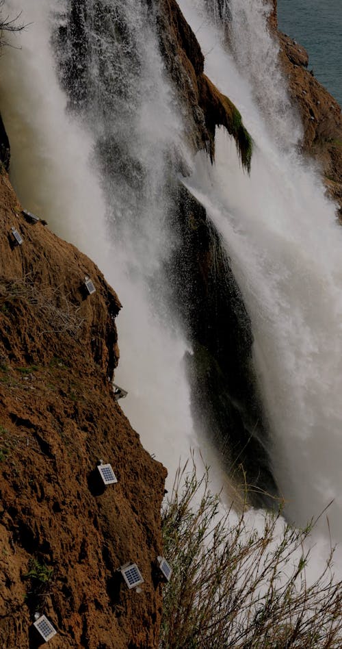 A Footage of a Waterfall Cascading