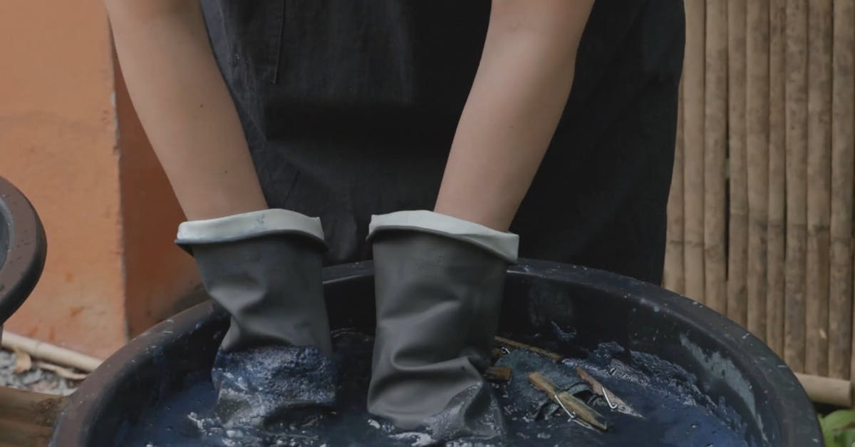 A Woman Washing Threads on a Basin with Water Free Stock Video Footage ...
