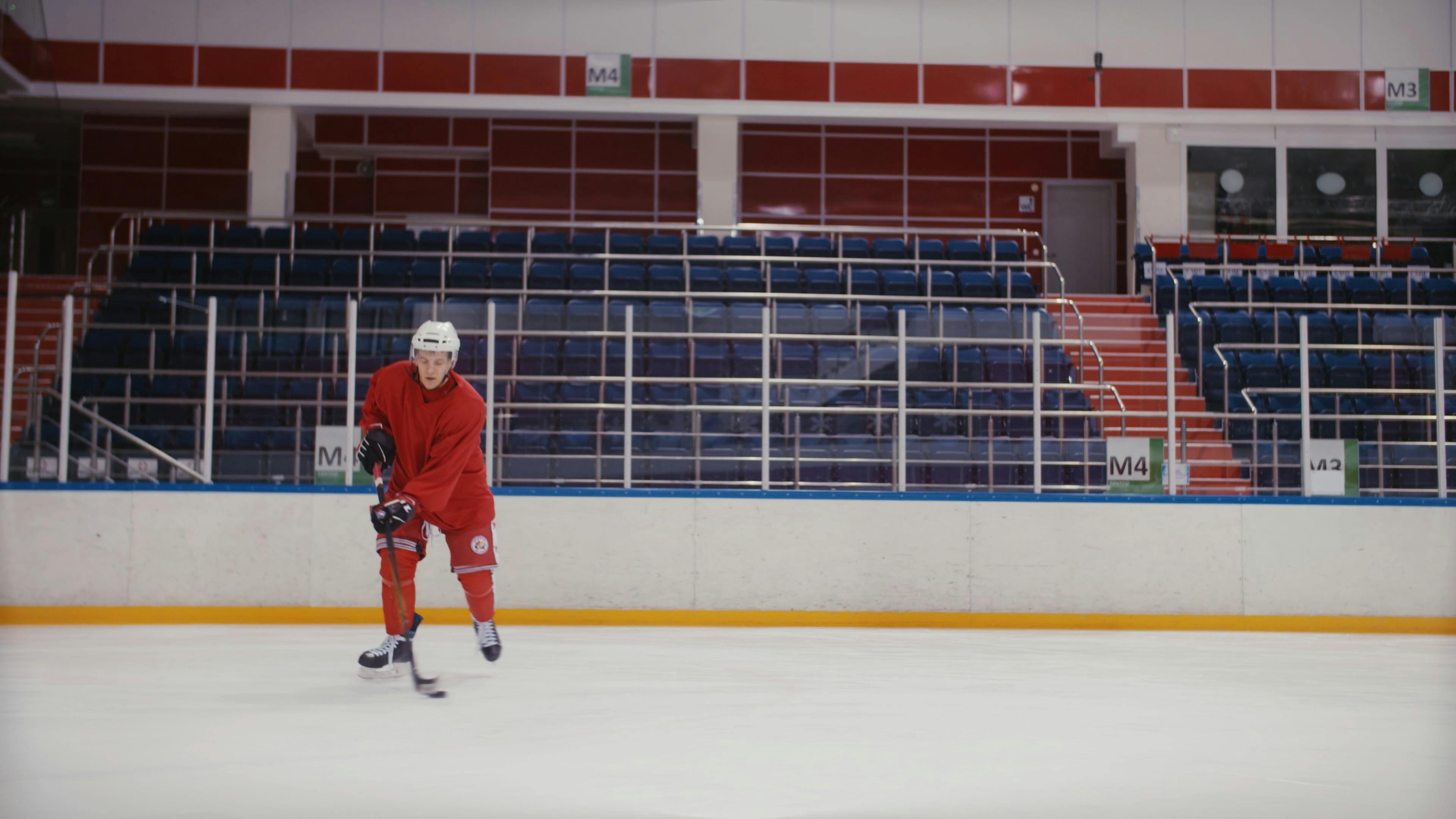 A Hockey Player Dribbling a Hockey Puck Free Stock Video Footage