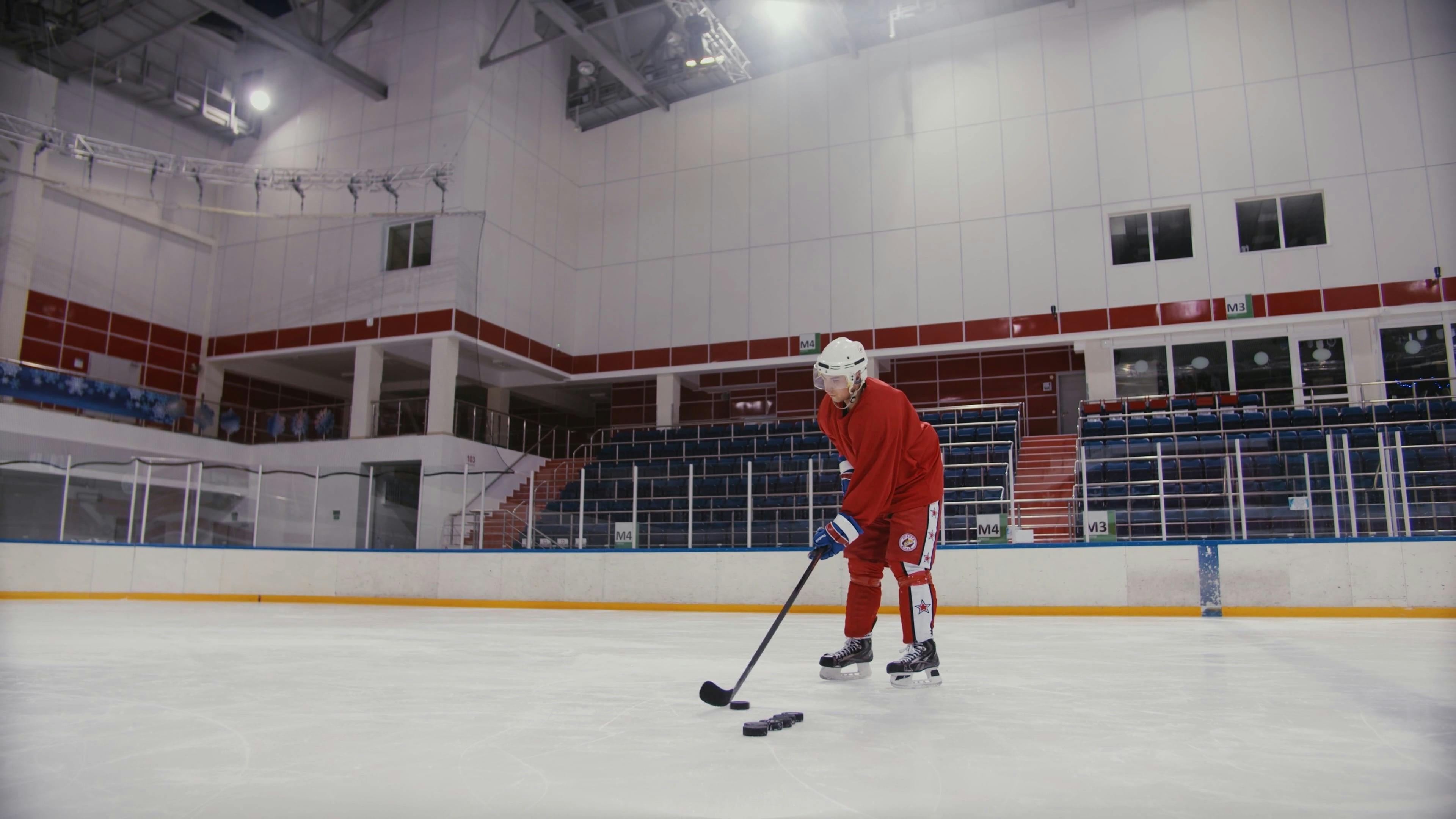 A Hockey Player Dribbling a Hockey Puck · Free Stock Video