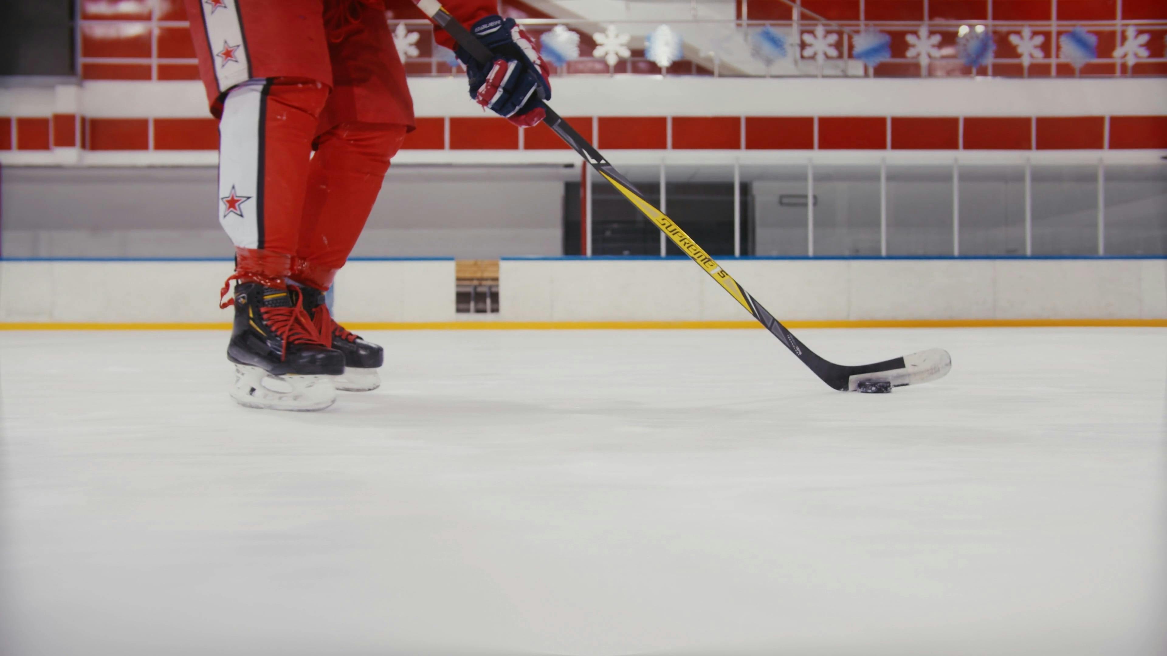 Ice Hockey Player Dribbling an Ice Hockey Puck Free Stock Video Footage, RoyaltyFree 4K & HD