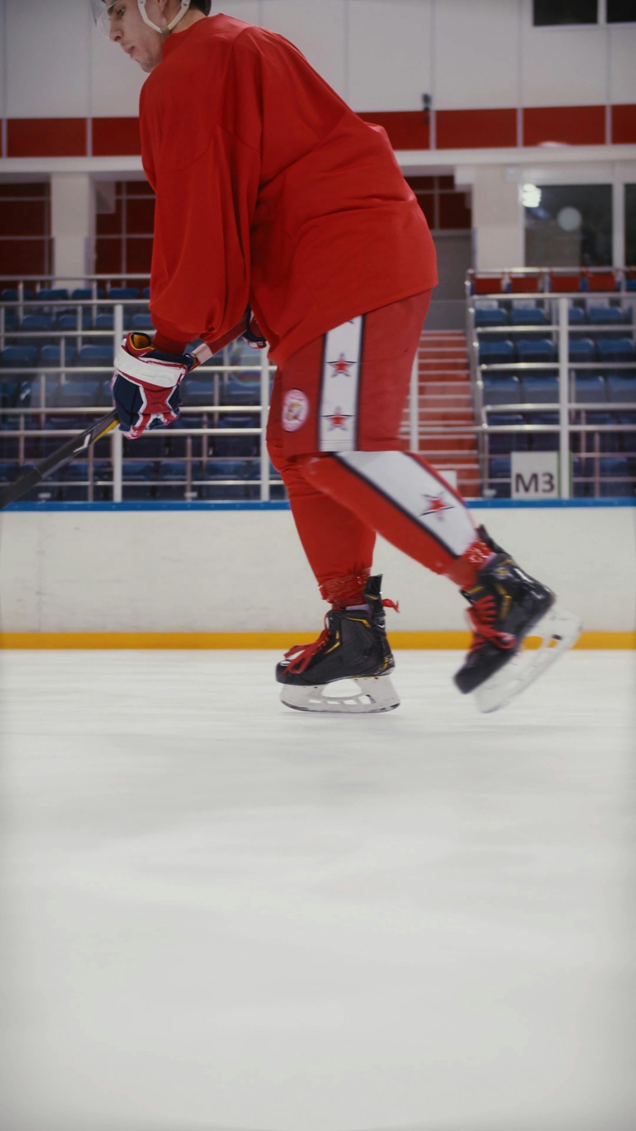 An Ice Hockey Player Dribbling and Shooting · Free Stock Video