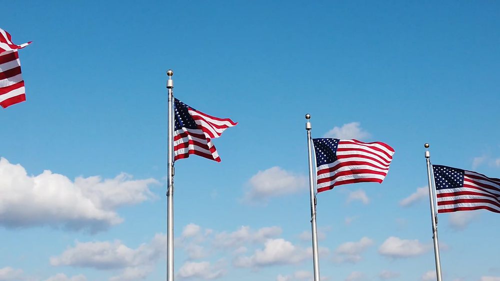 The American Flag Raised High In A Flag Pole Free Stock Video the-american-flag-raised-high-in-a-flag-pole-free-stock-video
