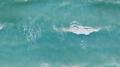 drone footage of blue ocean