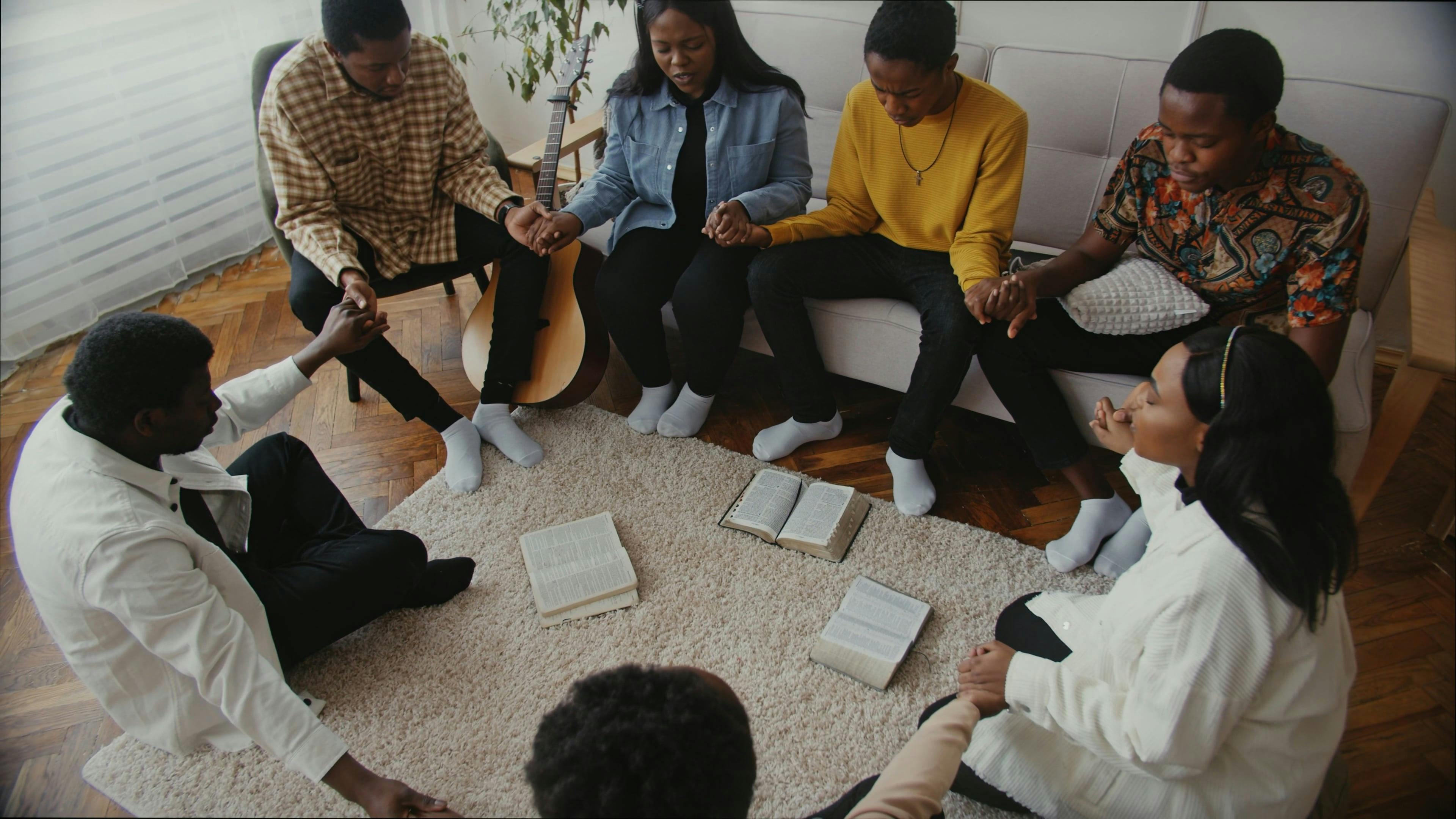 People Praying while Holding Each Other's Hands · Free Stock Video