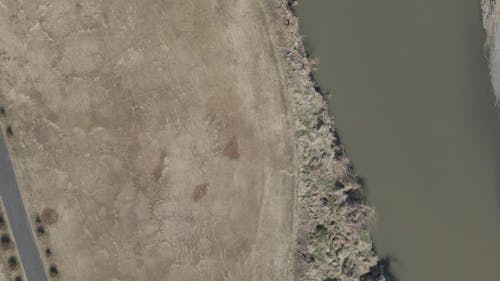 An Aerial Footage of a River beside a City