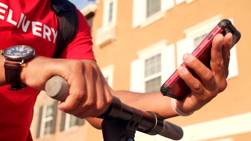 Close-Up View of a Man Using Cellphone