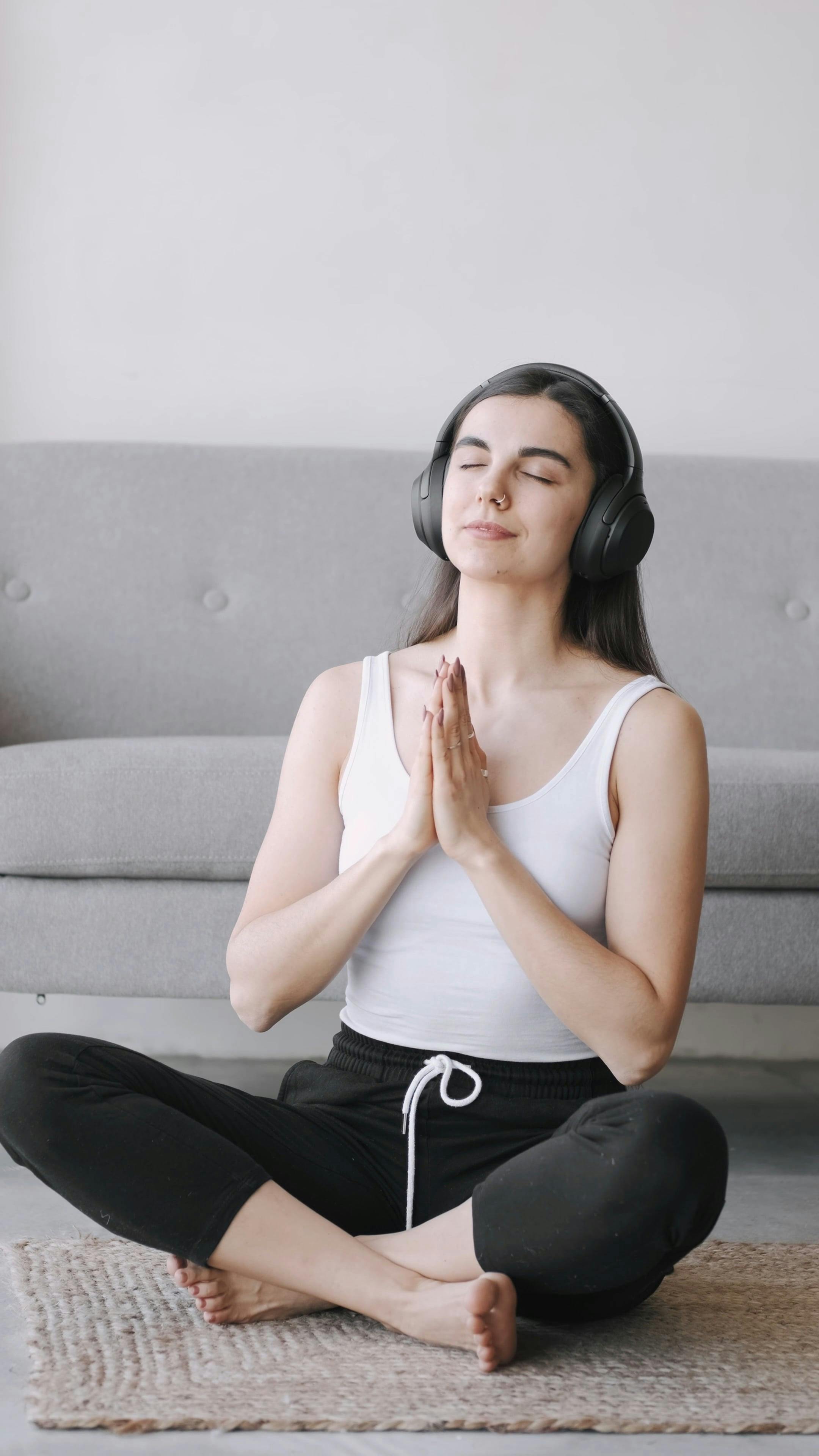 Woman Meditating while Listening to Music · Free Stock Video