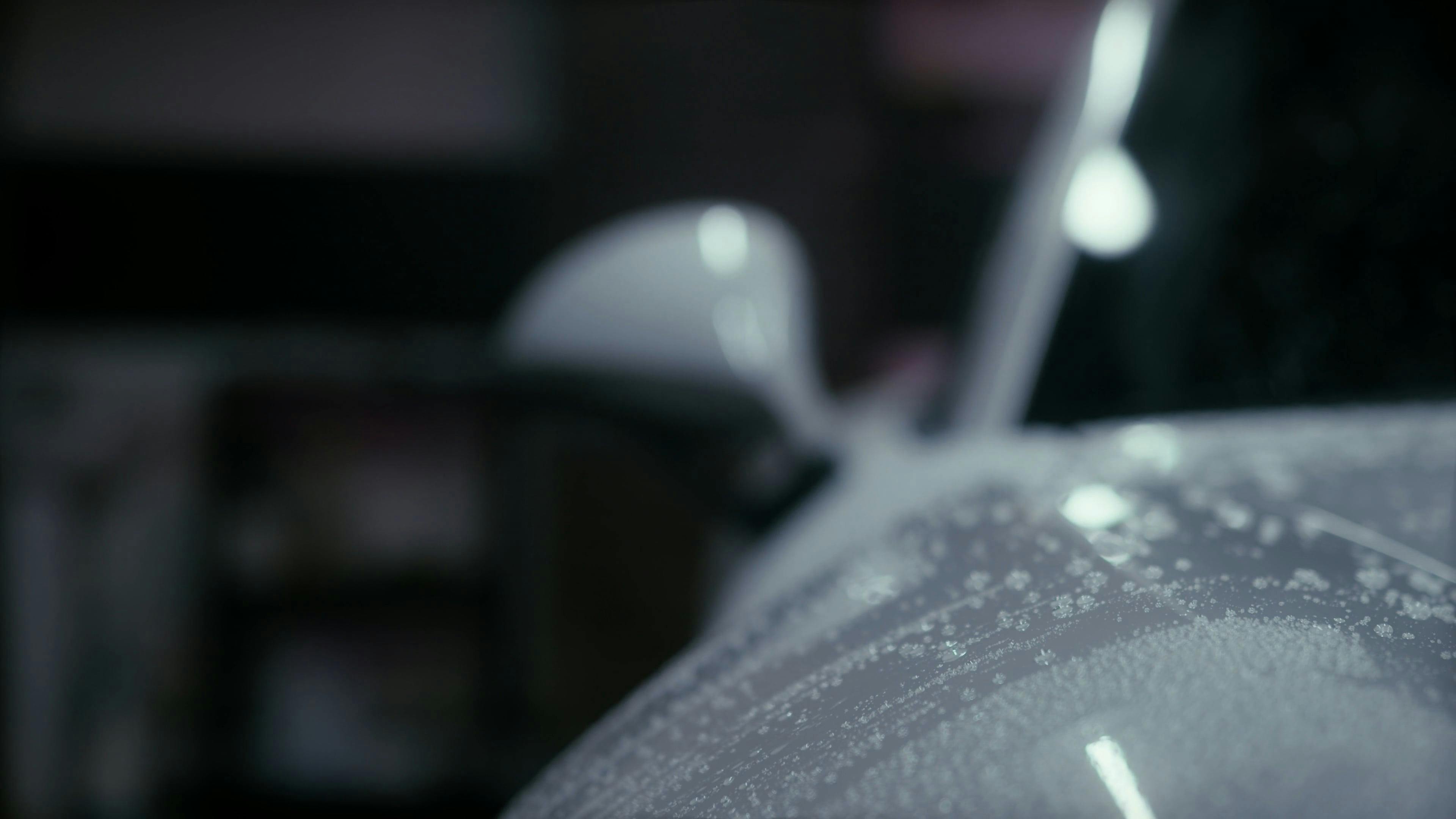 Water Droplets on a White Car After Being Washed · Free Stock Video