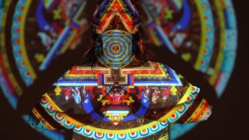 Woman Dancing while Projected with Lights