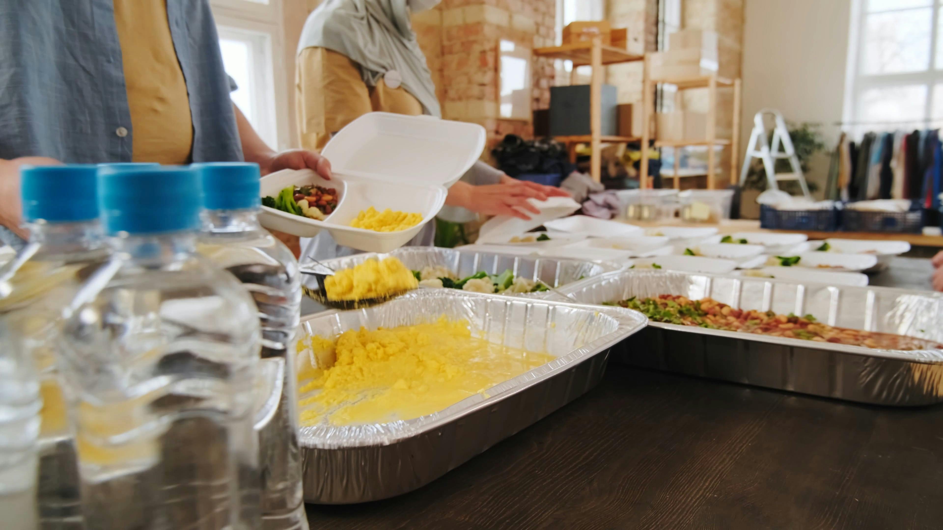 Volunteers Serving Food · Free Stock Video