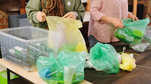 Volunteers Sorting Waste Materials