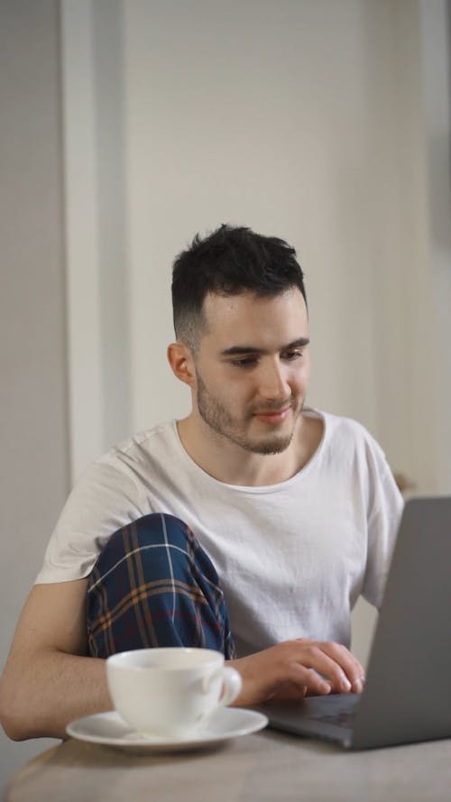 Man Browsing His Laptop