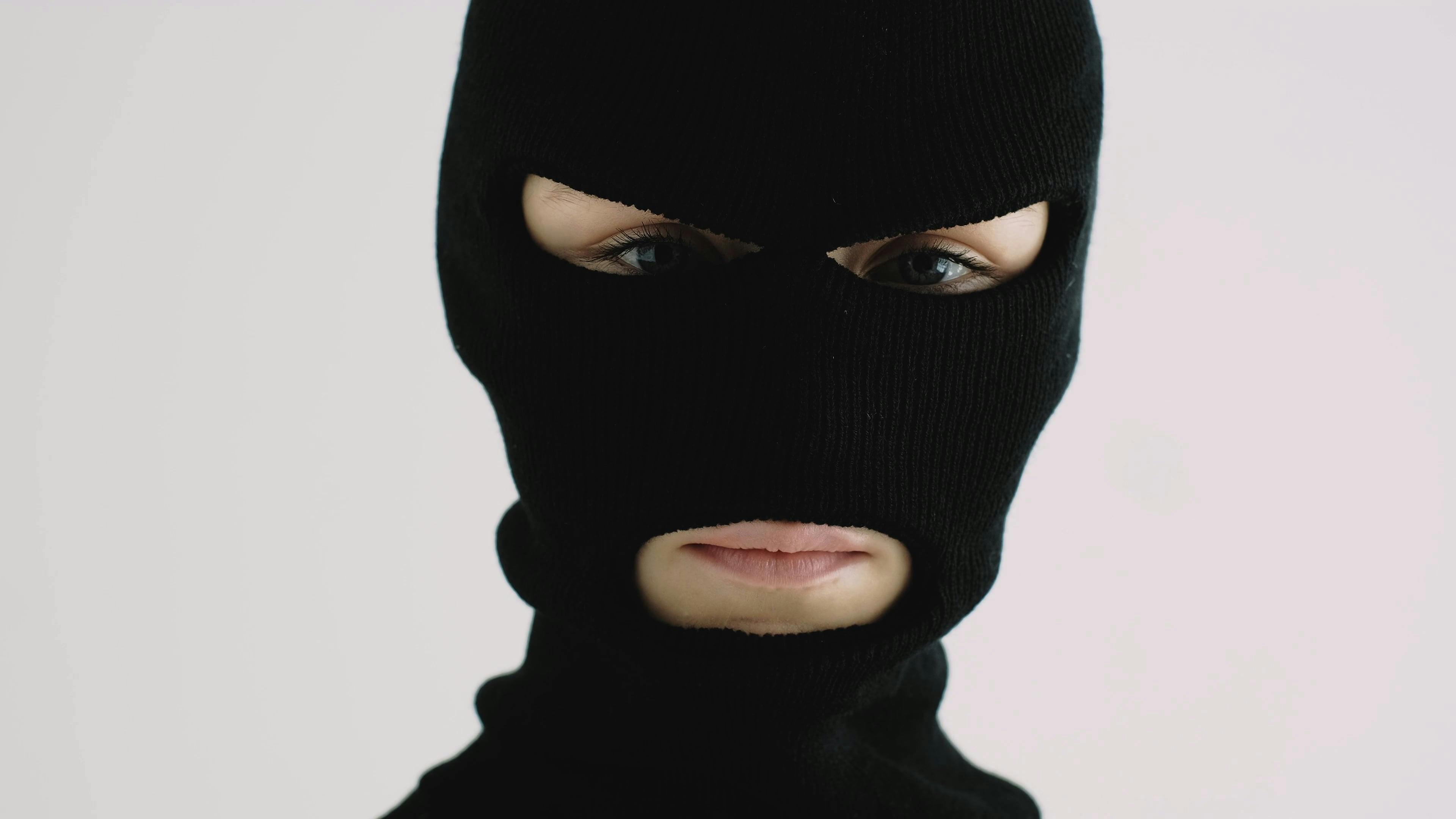 A Person Wearing a Robber Mask · Free Stock Video