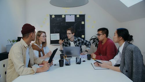 Young People Talking during a Meeting 