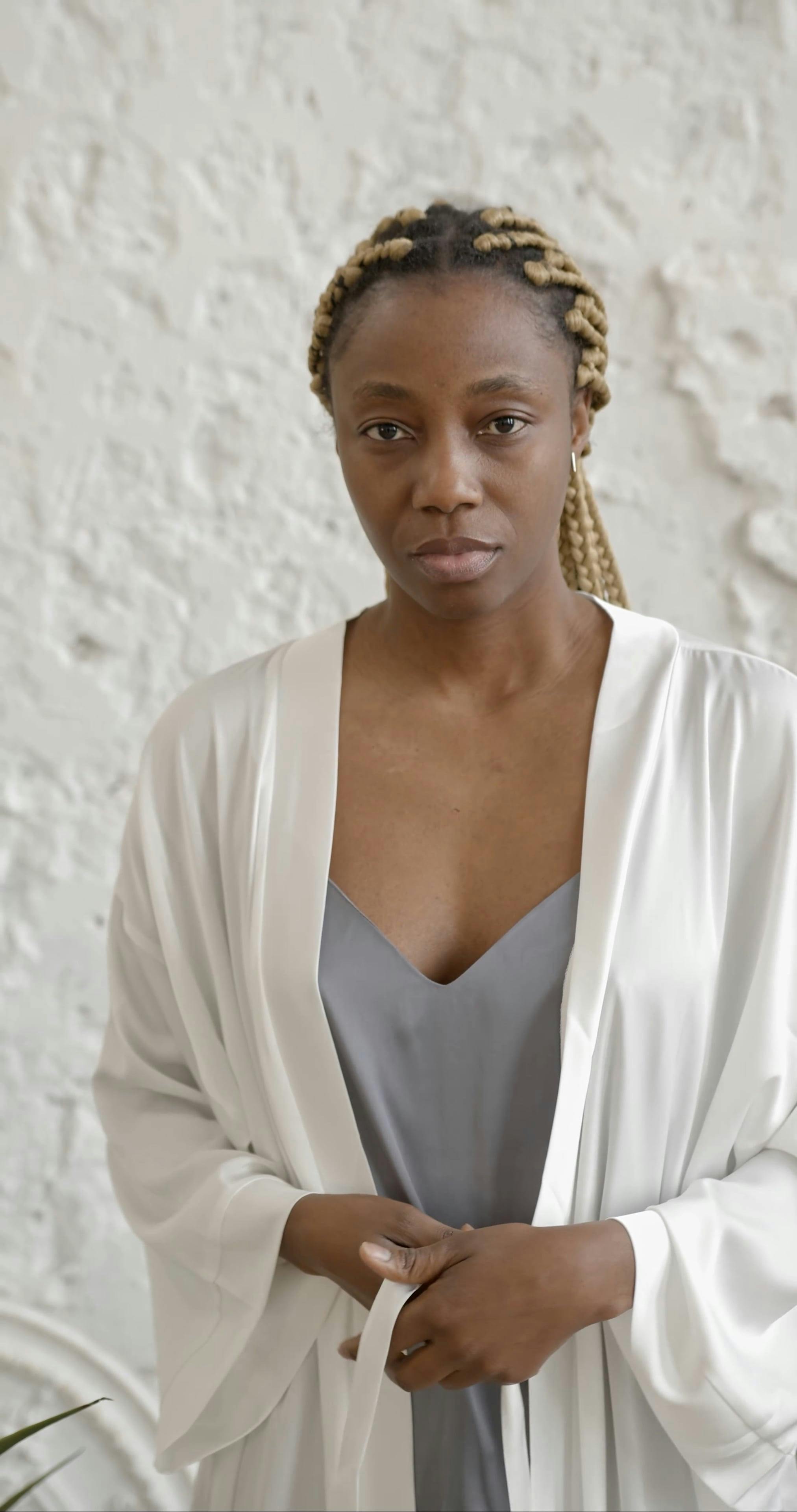 A Woman Tying her Bathrobe Belt Free Stock Video Footage, RoyaltyFree