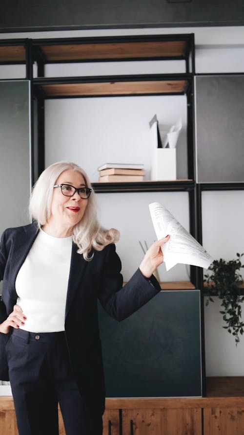 Accountant Holding Documents