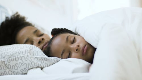 A Mother and Daughter Sleeping