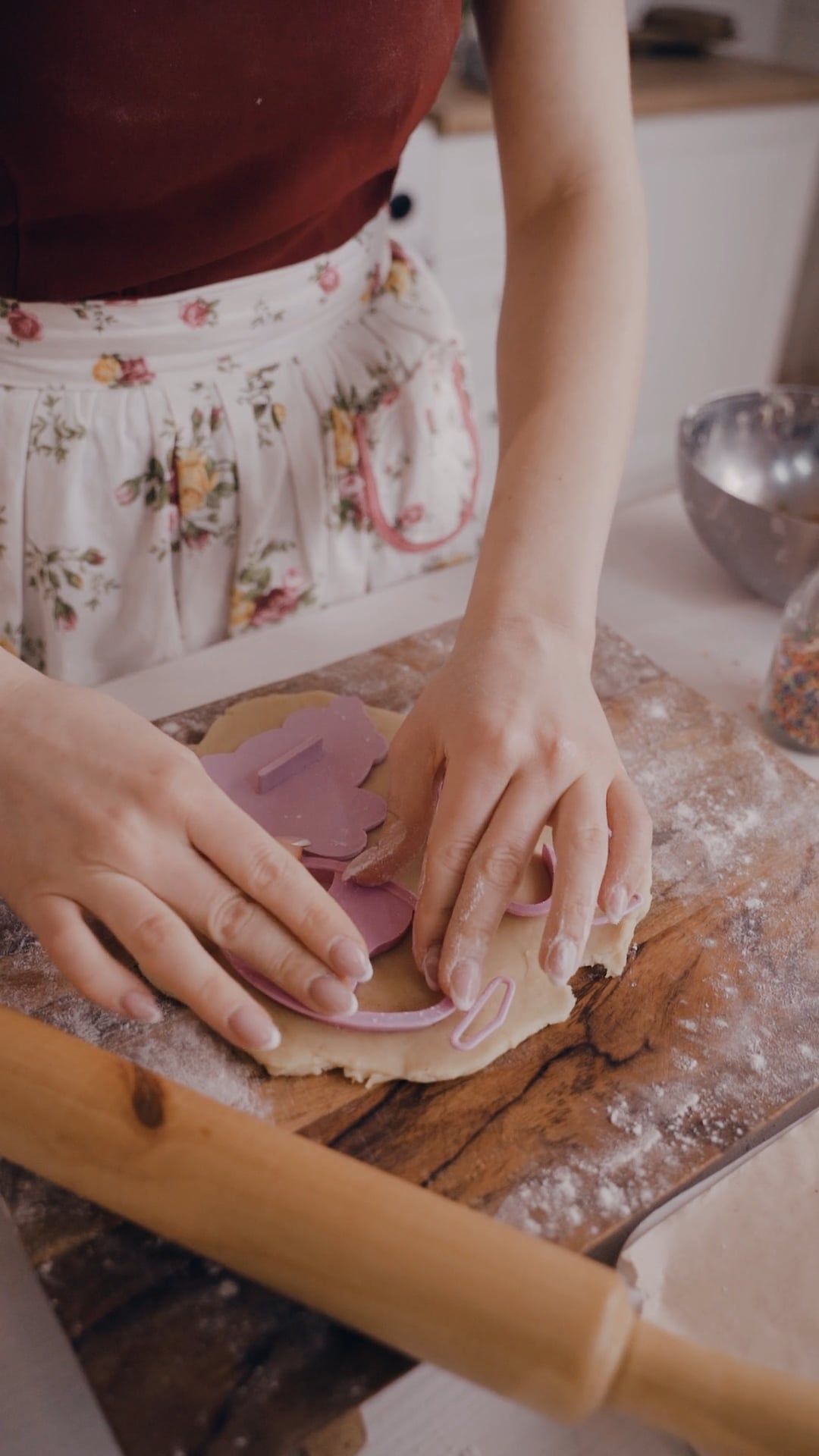 a person molding on a flat dough 6942838