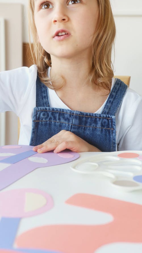 A Young Girl Playing As A Painter
