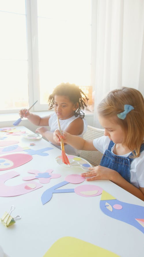 Two Girls Doing Some Artworks