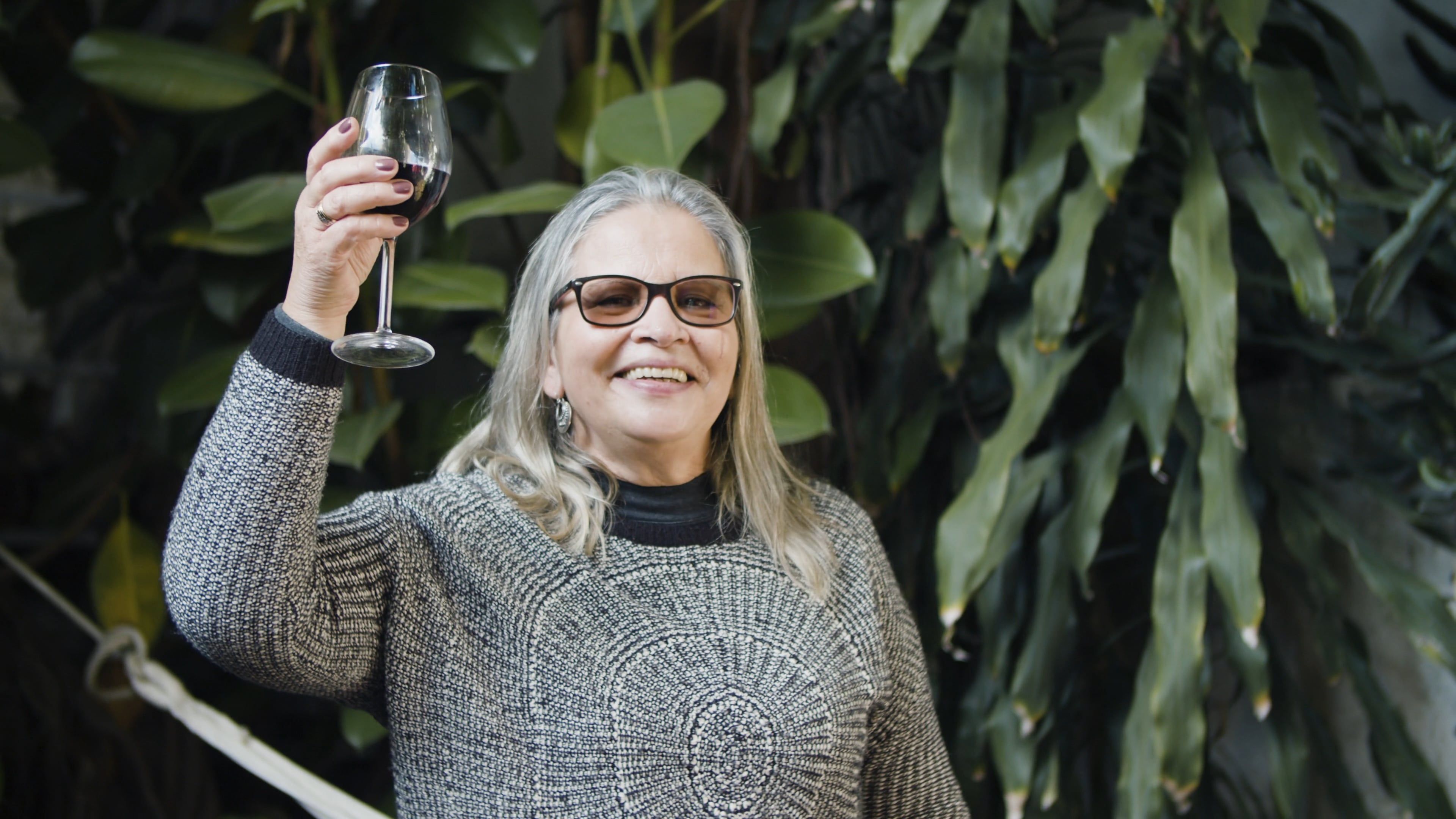 Elderly Woman Holding a Glass of Wine · Free Stock Video