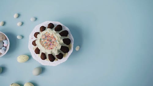 An Overhead Shot of Easter Cake and Eggs